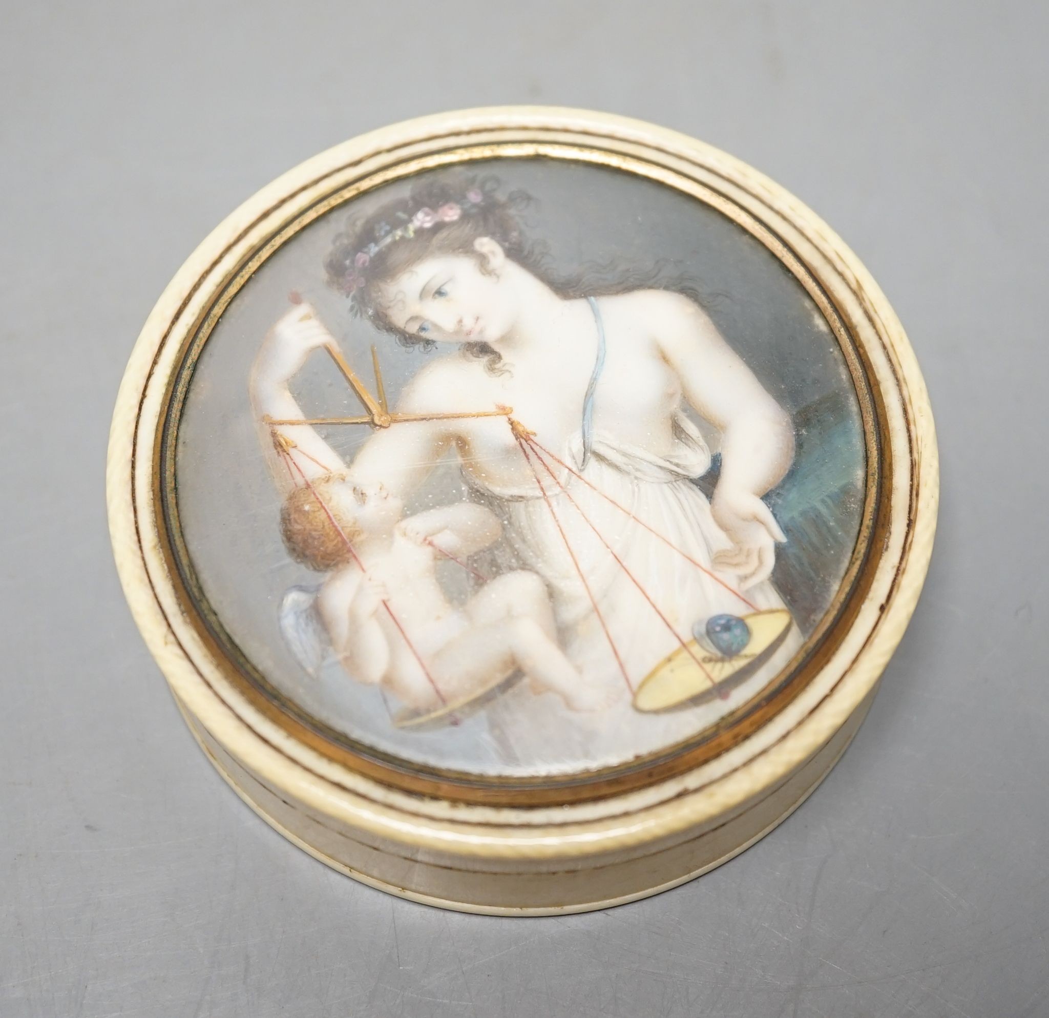 An early 19th century ivory and tortoishell box with inset miniature of Themis to cover, 8cm.